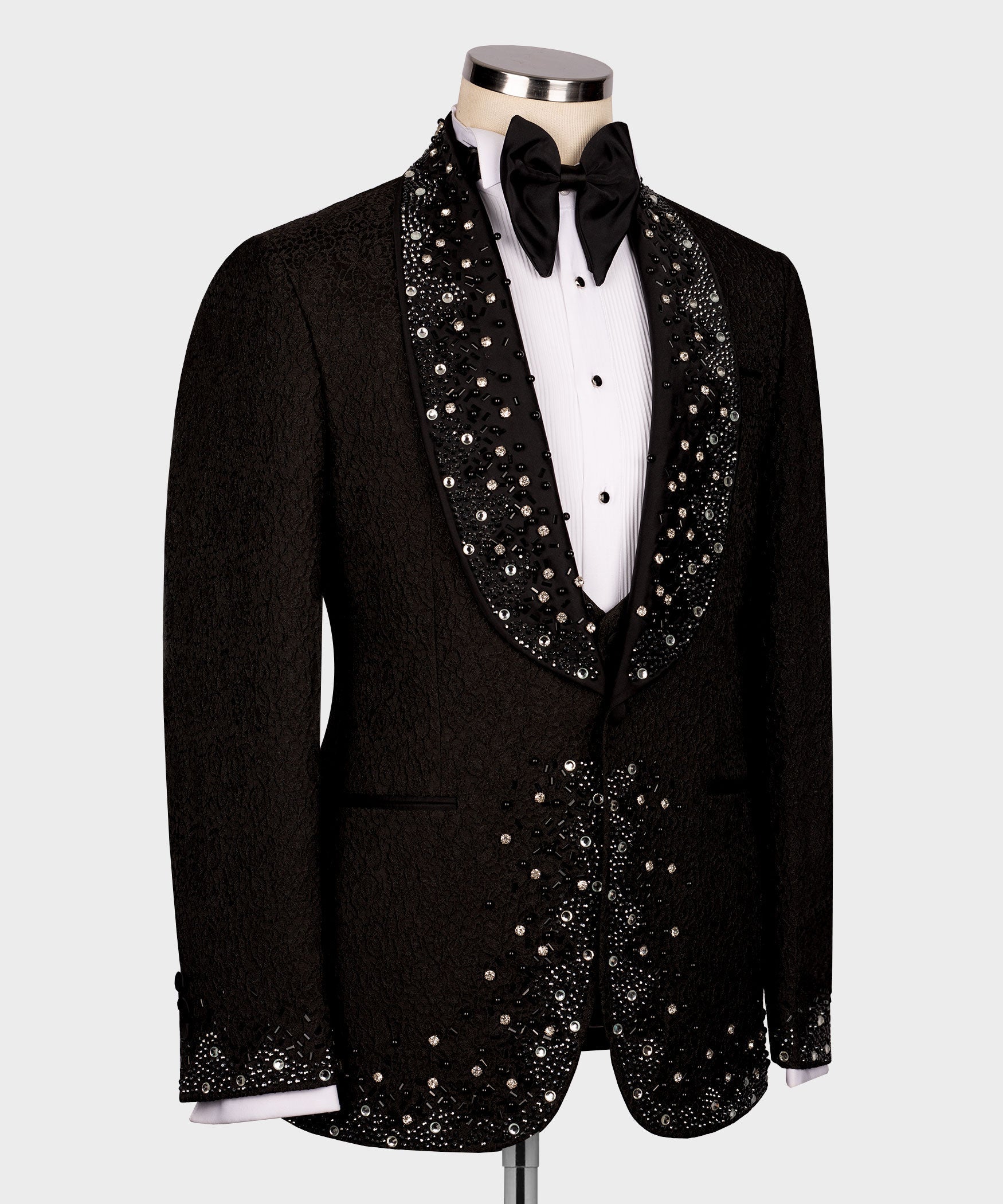 Black tuxedo jacket with heavily jeweled V-lapel trim and matching front