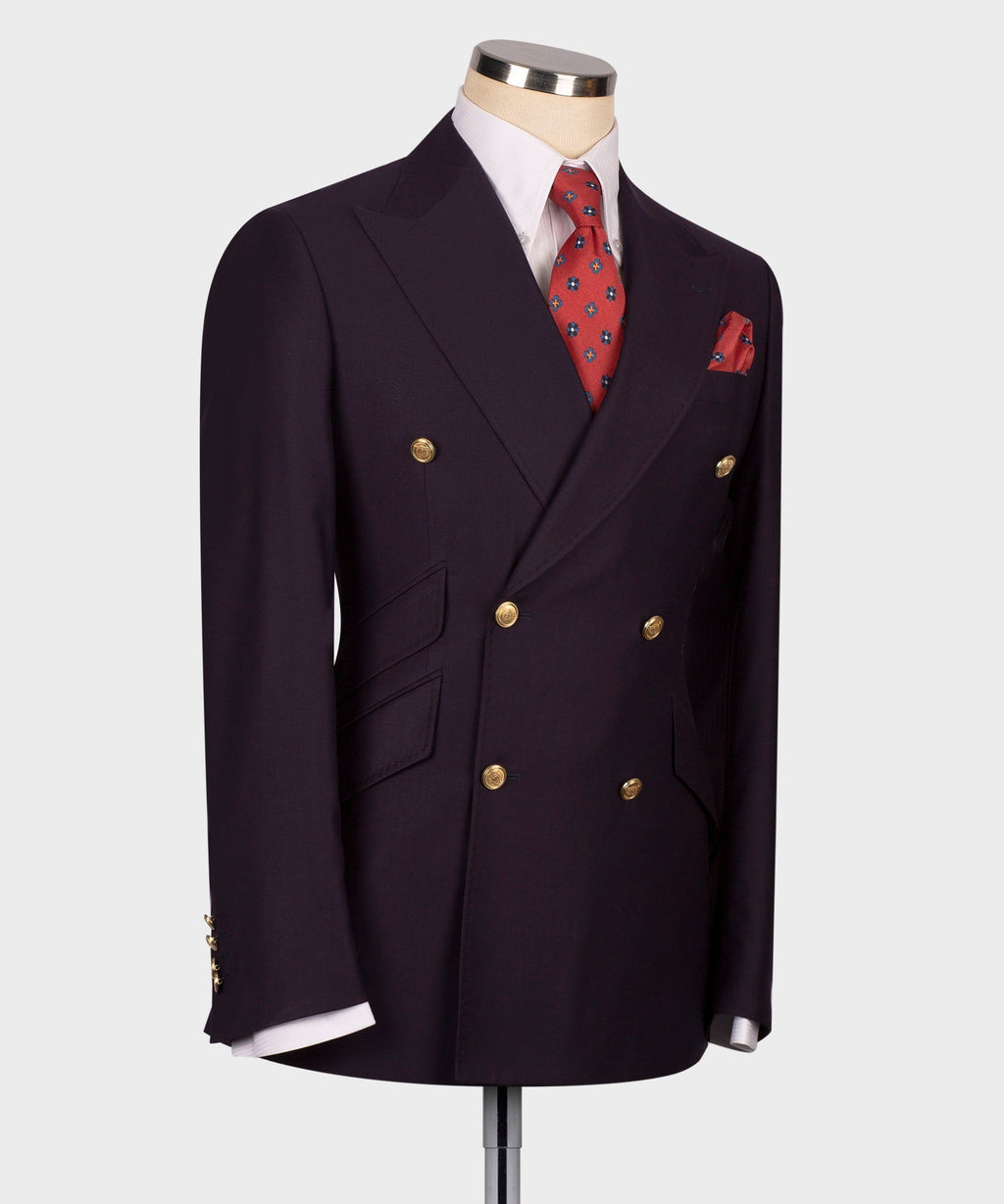 Dark plum double-breasted suit jacket front, gold buttons and pocket details