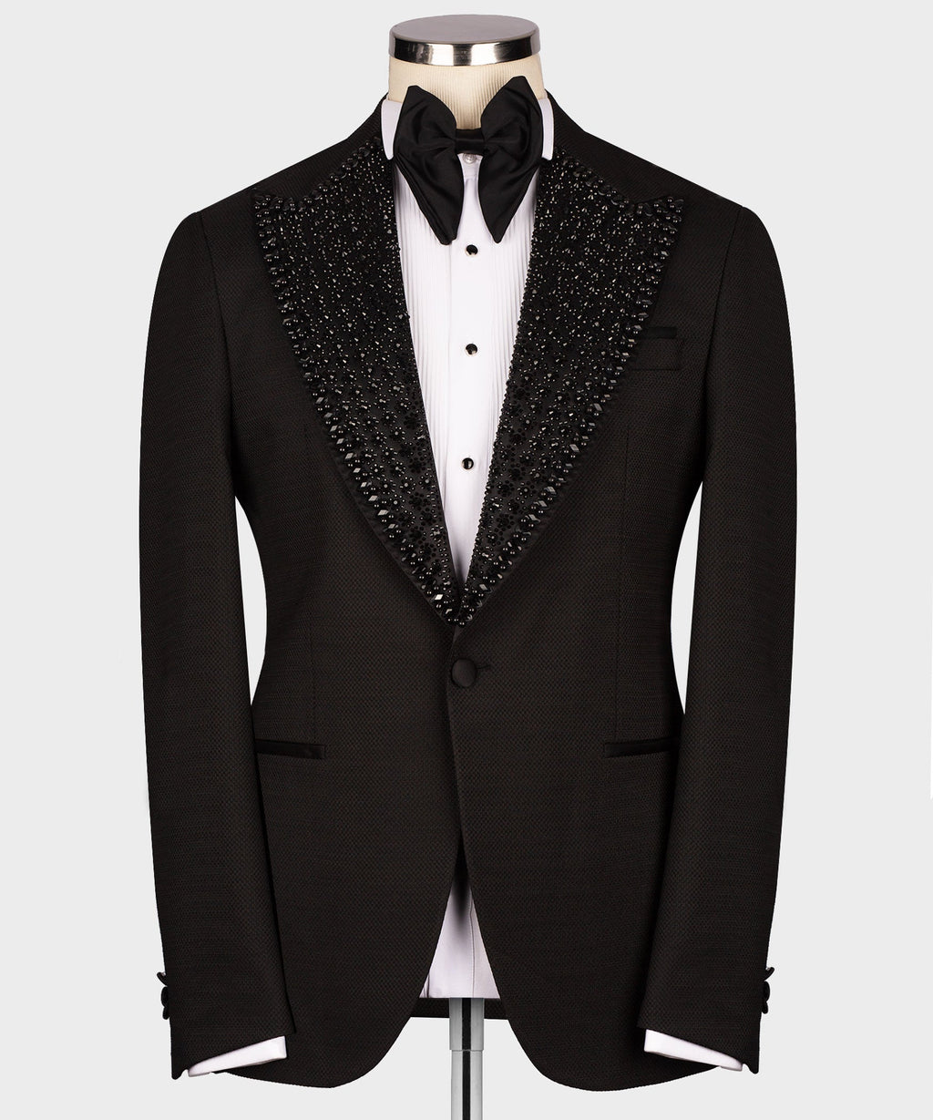 Black tuxedo jacket with gem-stone embellished shawl lapel and black bow tie