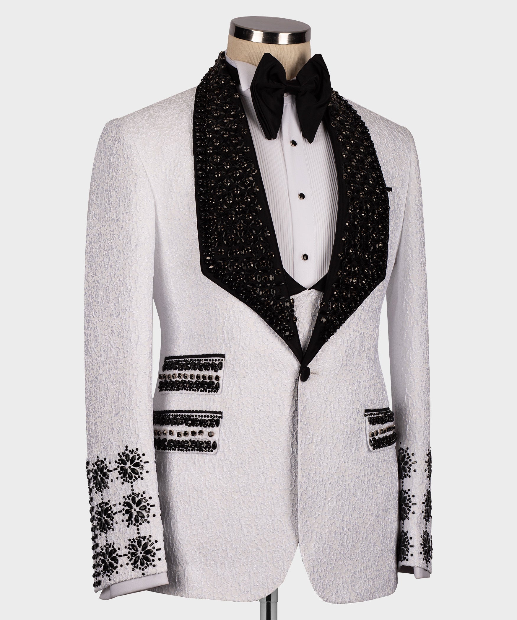 White tuxedo jacket with black embellished waistcoat and crystal trim cuffs