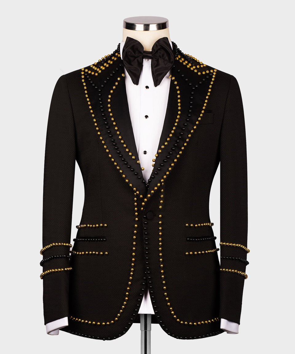 Black tuxedo jacket with gold pearl trim V-lapel, matching bow tie and white shirt front