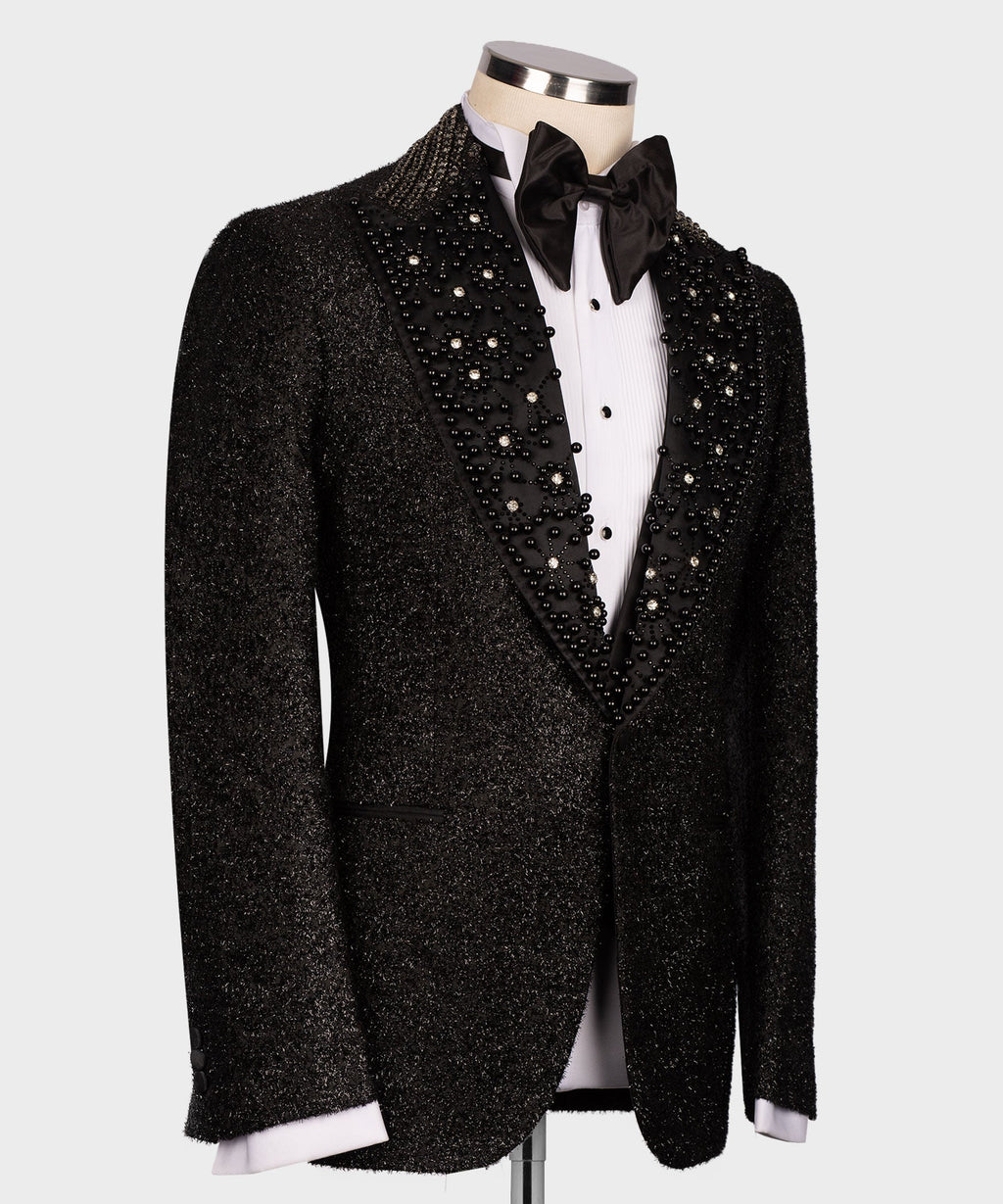 Black tuxedo jacket front view with bead-embellished lapels and bow tie