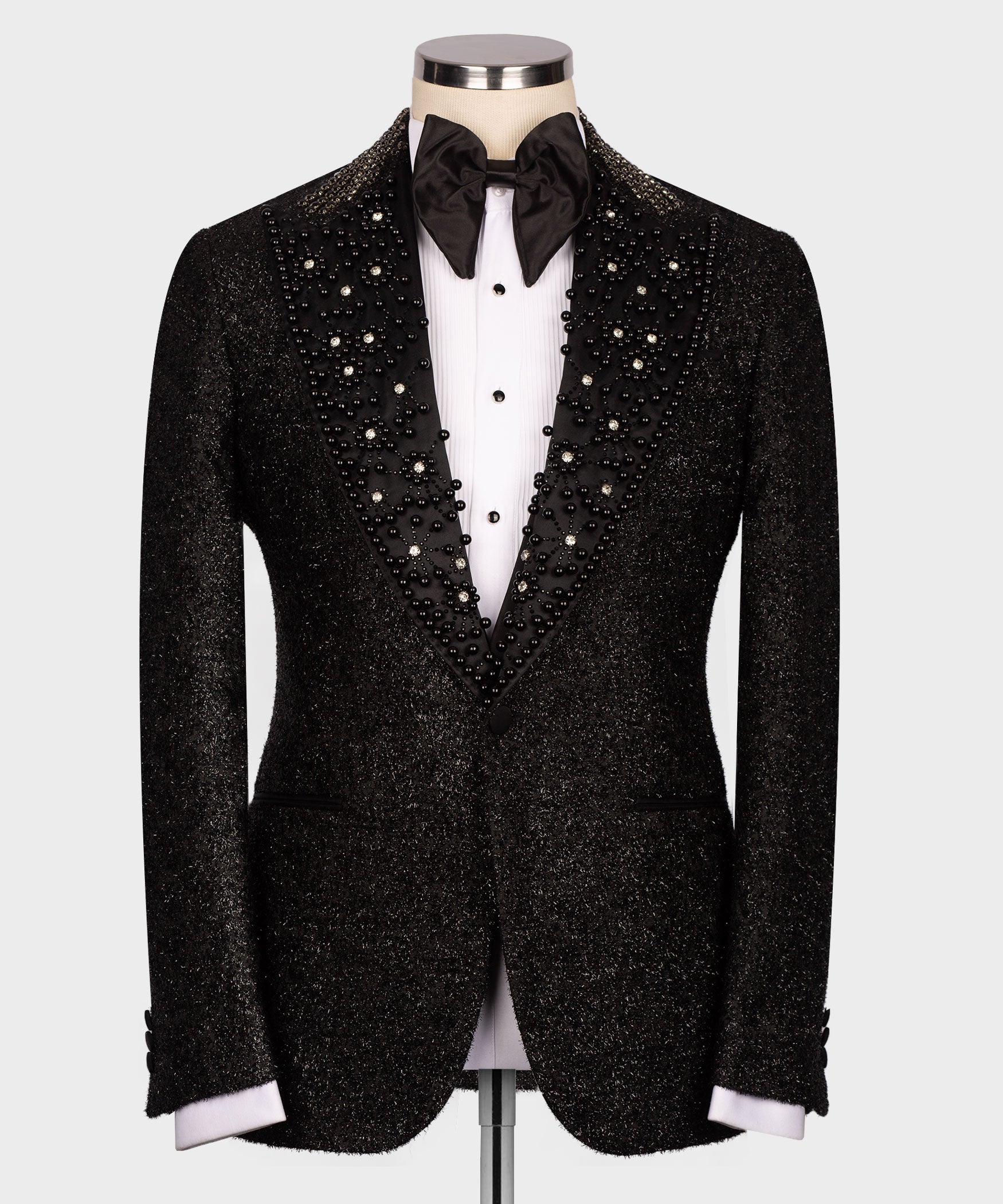 Black tuxedo jacket with sparkling beadwork panels and satin trim, peak lapels
