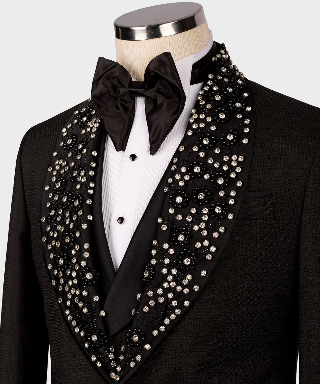 Close-up: black tuxedo with satin bow tie and rhinestone-trim lapels