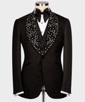Black tuxedo jacket with rhinestone lapels and black satin bow tie