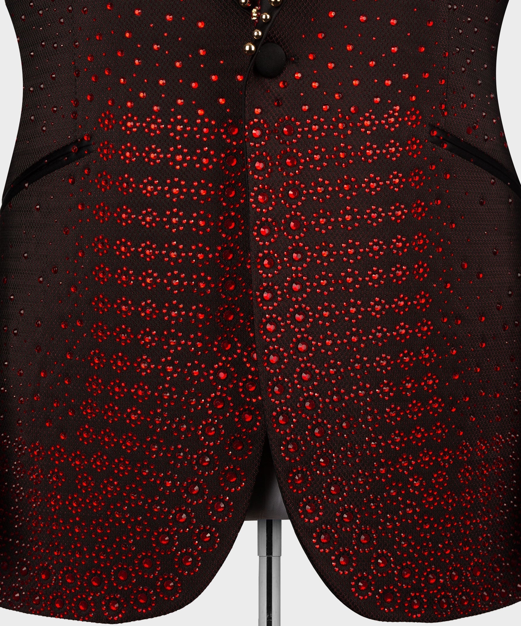 Burgundy tuxedo front with red circular embellishment pattern and dark button closure