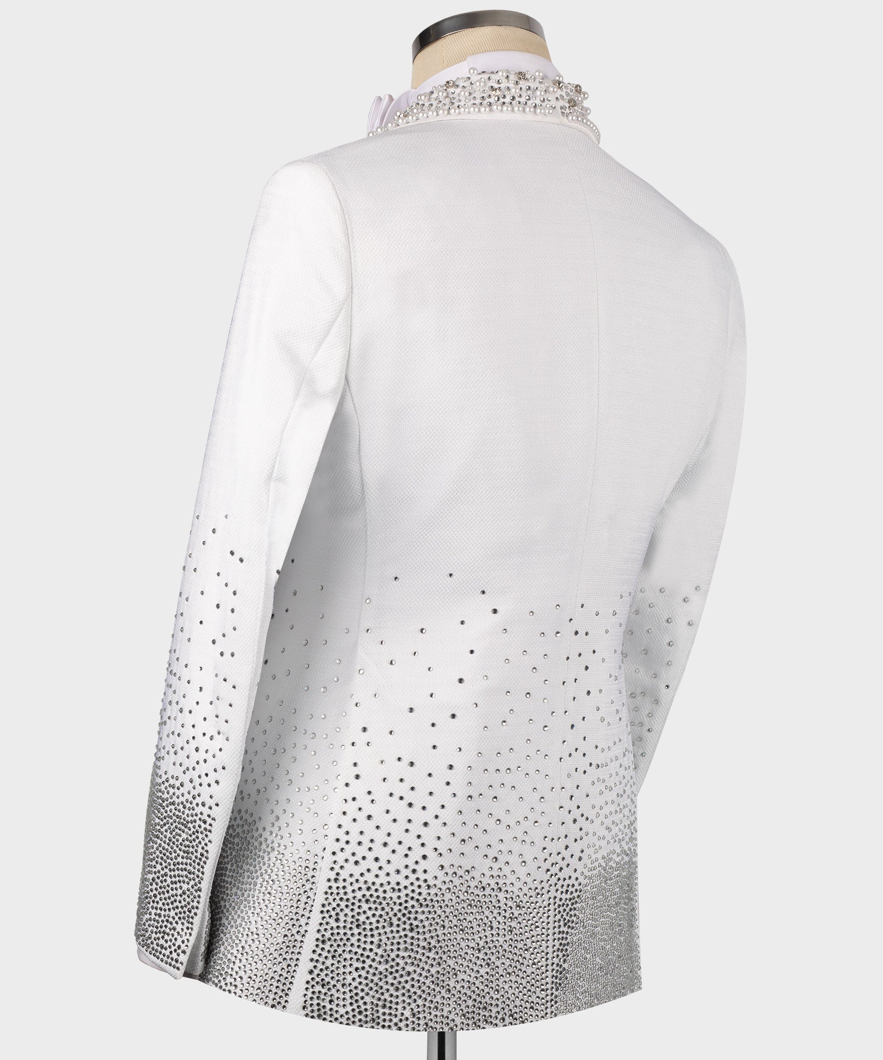 White tuxedo jacket back with silver rhinestone detail from waist to hem