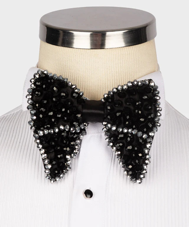 Koss Atelier black silk bow tie featuring intricate black and silver beaded detailing, styled on a white dress shirt.
