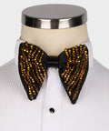 Beaded bow tie with black satin base and gold beaded pattern