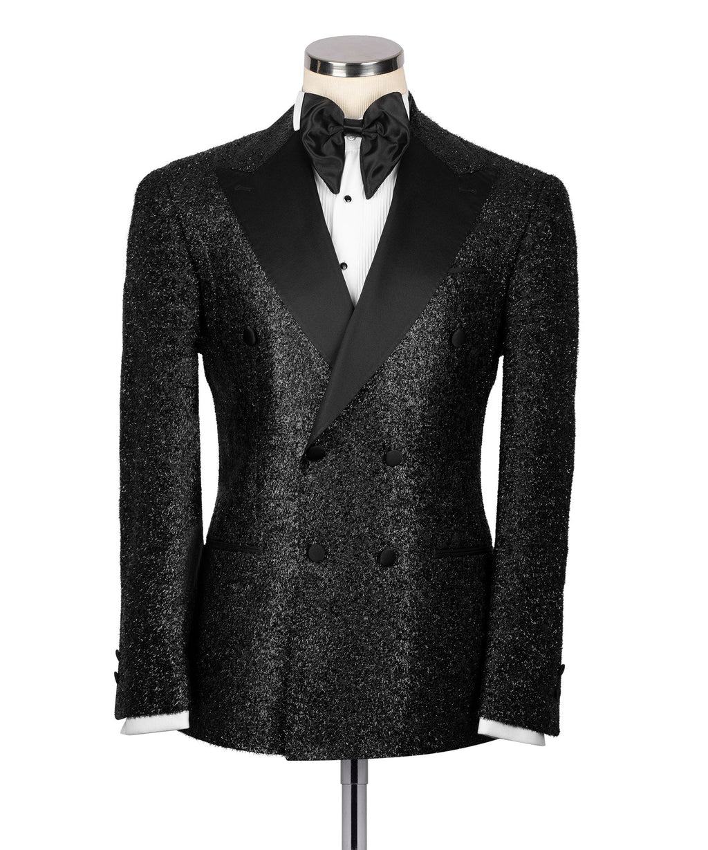 Black glitter tuxedo jacket with satin bow tie and peak lapels
