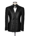 Black glitter tuxedo jacket with satin bow tie and peak lapels