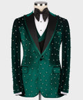 Green velvet tuxedo jacket with pearl studs, black bow tie and dress shirt