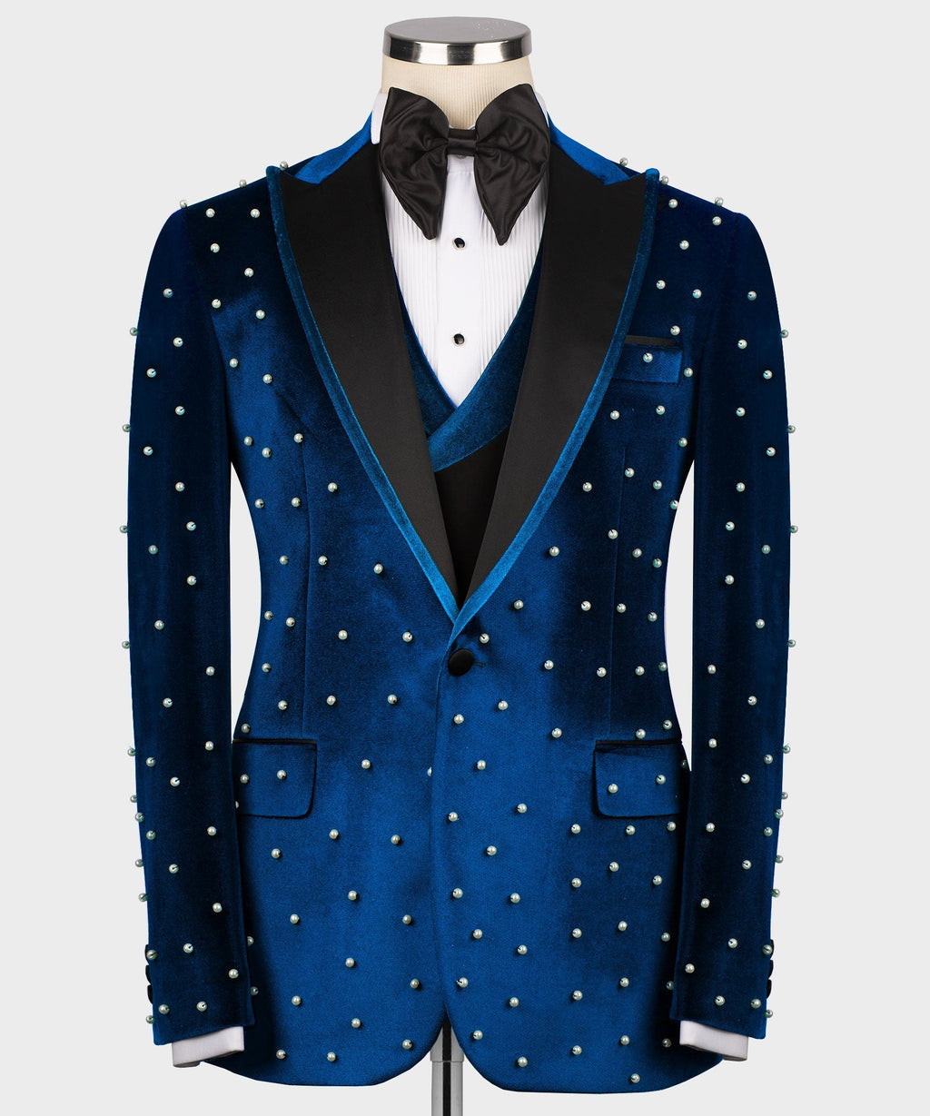 Blue velvet tuxedo jacket with pearl-like studs, notch lapels and front pockets