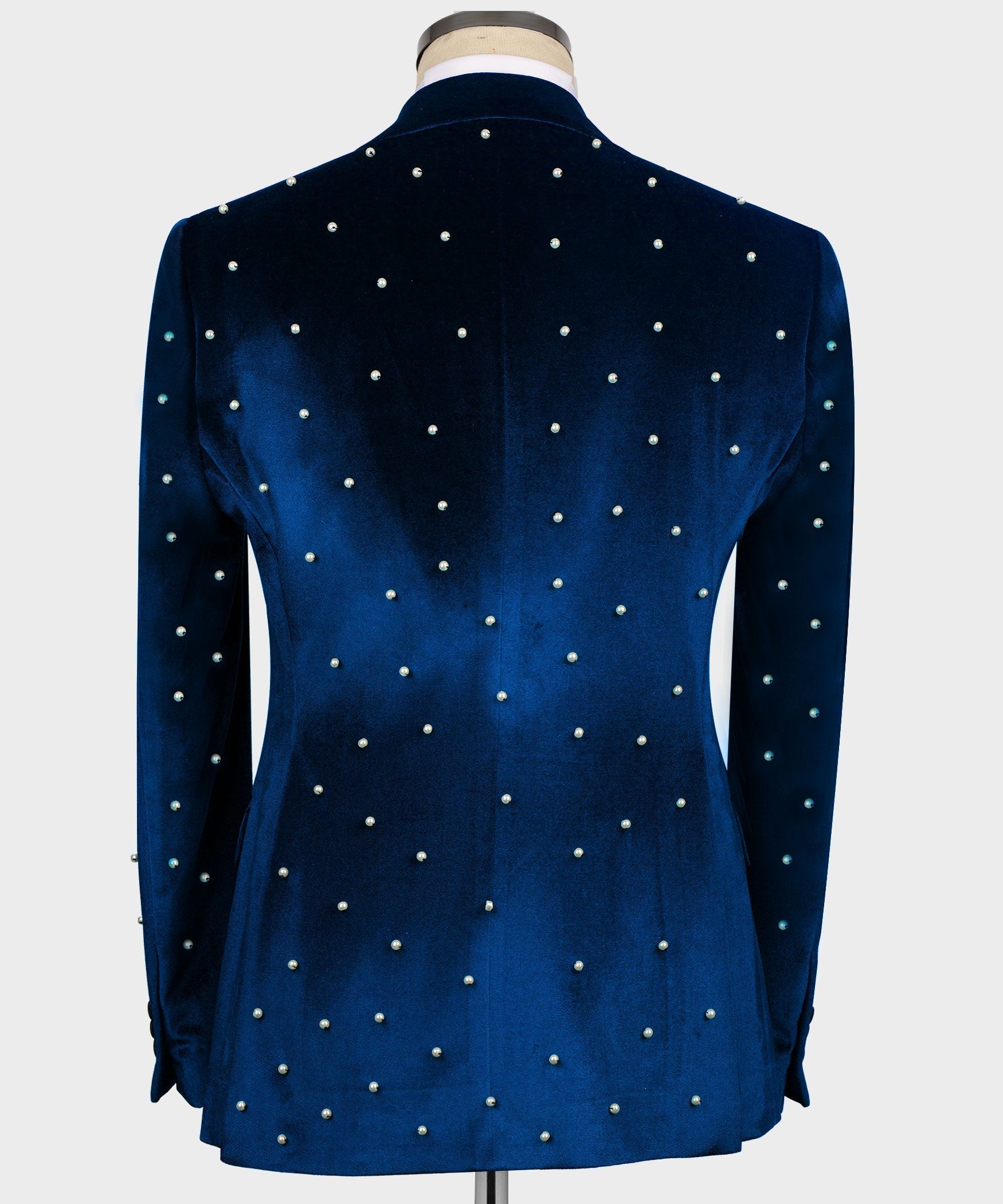 Back view of blue velvet tuxedo jacket with pearl stud embellishment