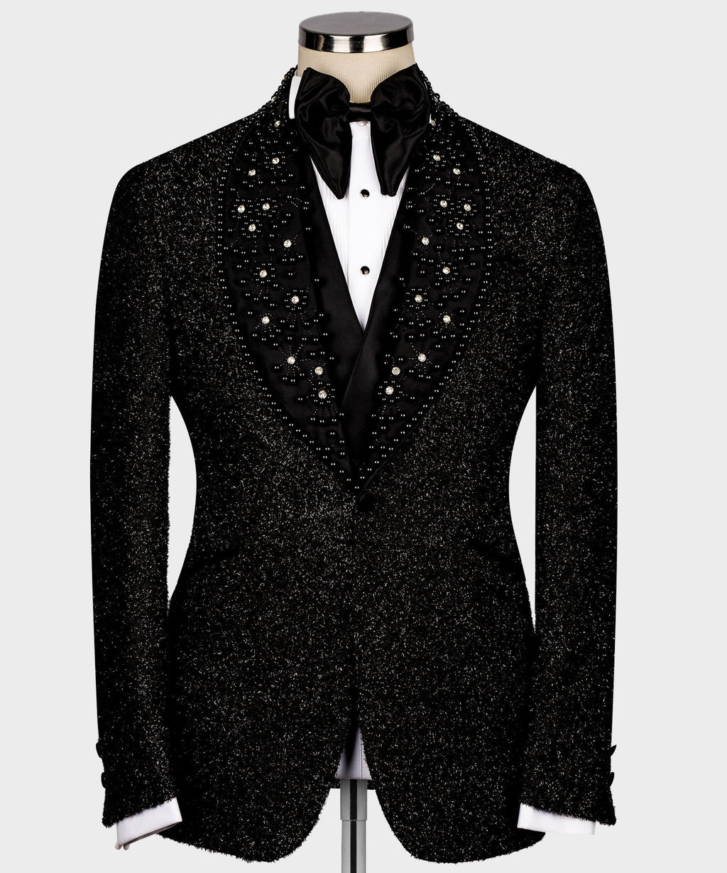 Black glitter tuxedo jacket front with rhinestone details and white shirt cuffs