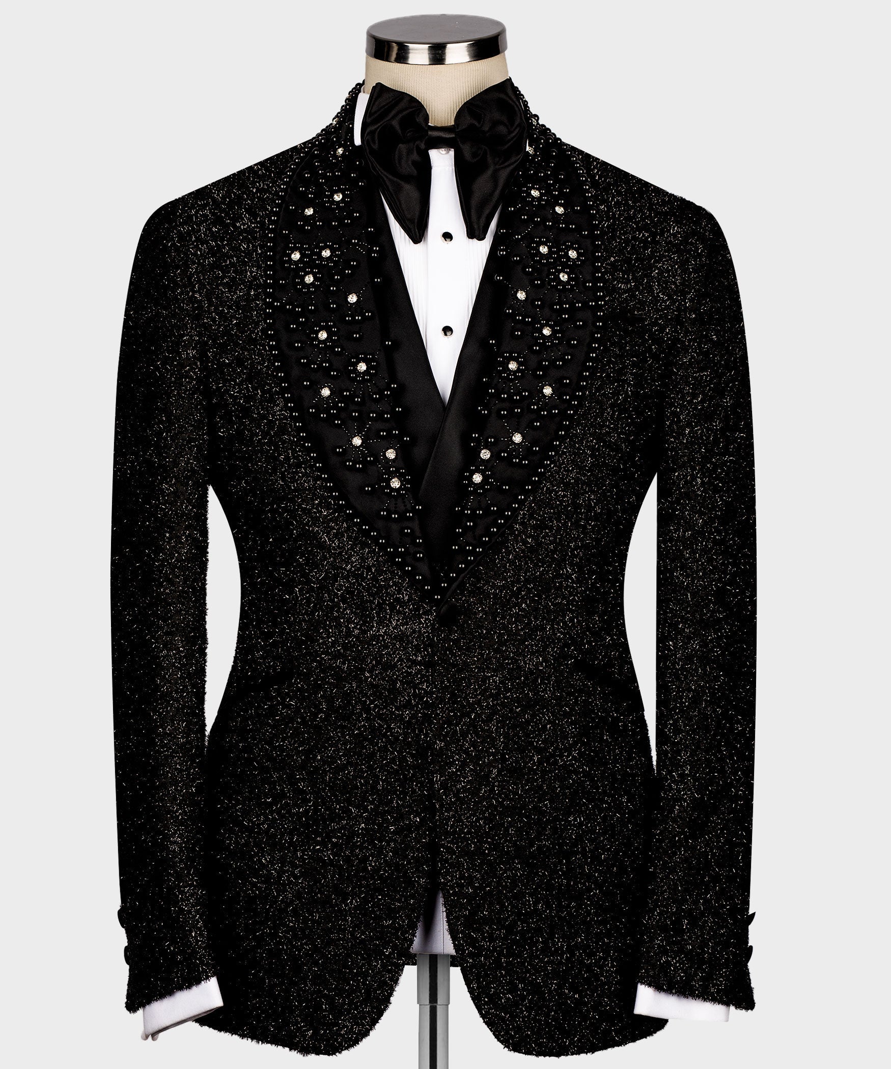 Black glitter tuxedo jacket front with rhinestone details and white shirt cuffs