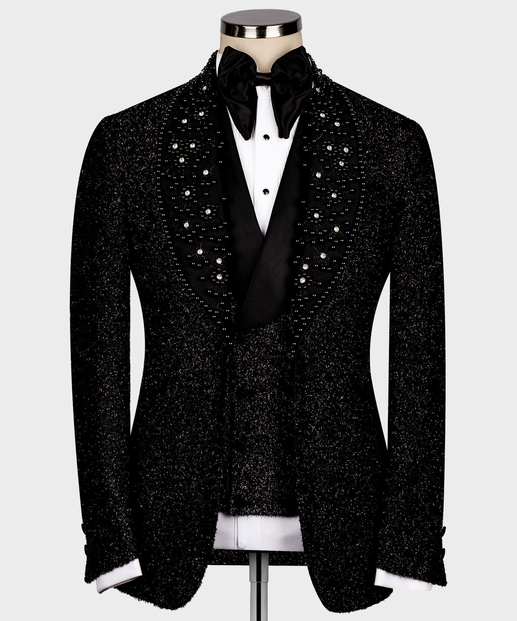 Black glitter tuxedo jacket with gemstone-style embellishments and satin black lapels