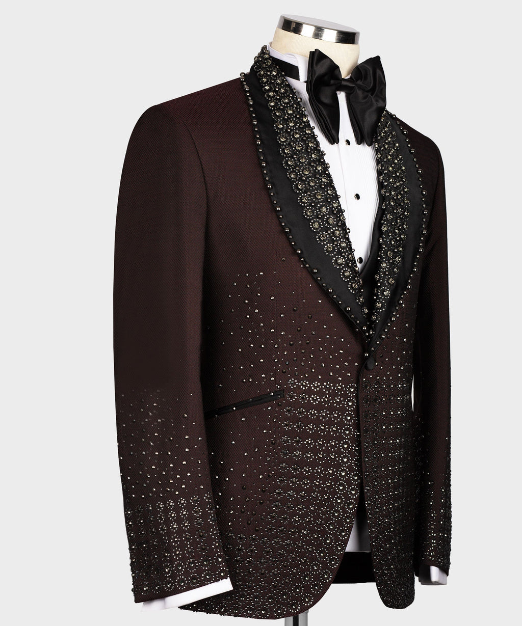 Burgundy tuxedo jacket side view with beaded black lapel trim and matching patterned fabric
