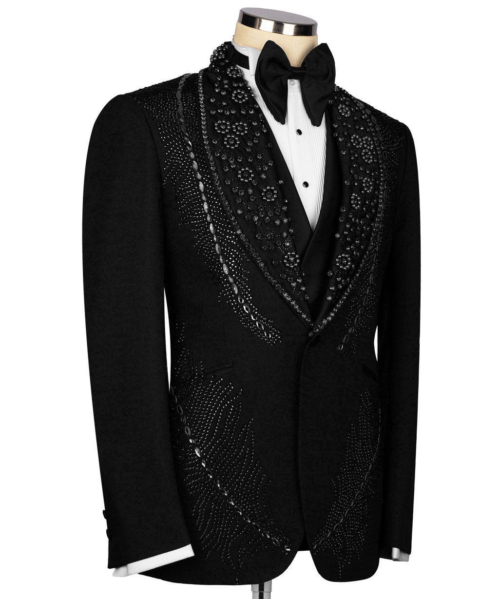 Black tuxedo jacket with gold-tone stone embroidery panels and black satin bow tie