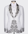 White tuxedo jacket with black gemstone embroidery on lapels and front