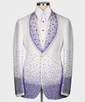 White tuxedo jacket with blue and silver rhinestone shawl lapels and bow tie