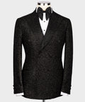 Black gemstone-embroidered tuxedo jacket with satin lapels and double-breasted buttons