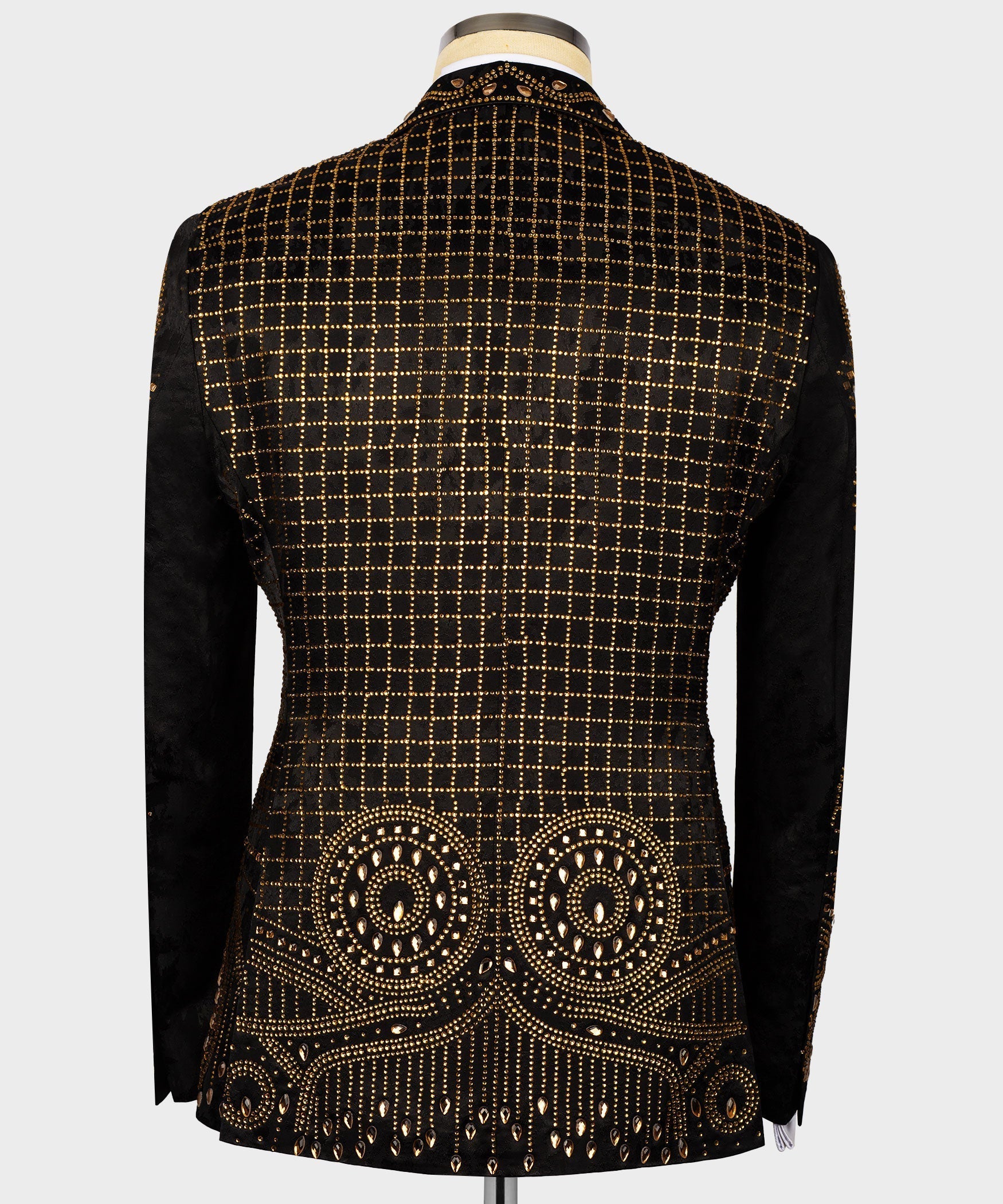 Black tuxedo jacket back with gold grid and circular embroidered motifs