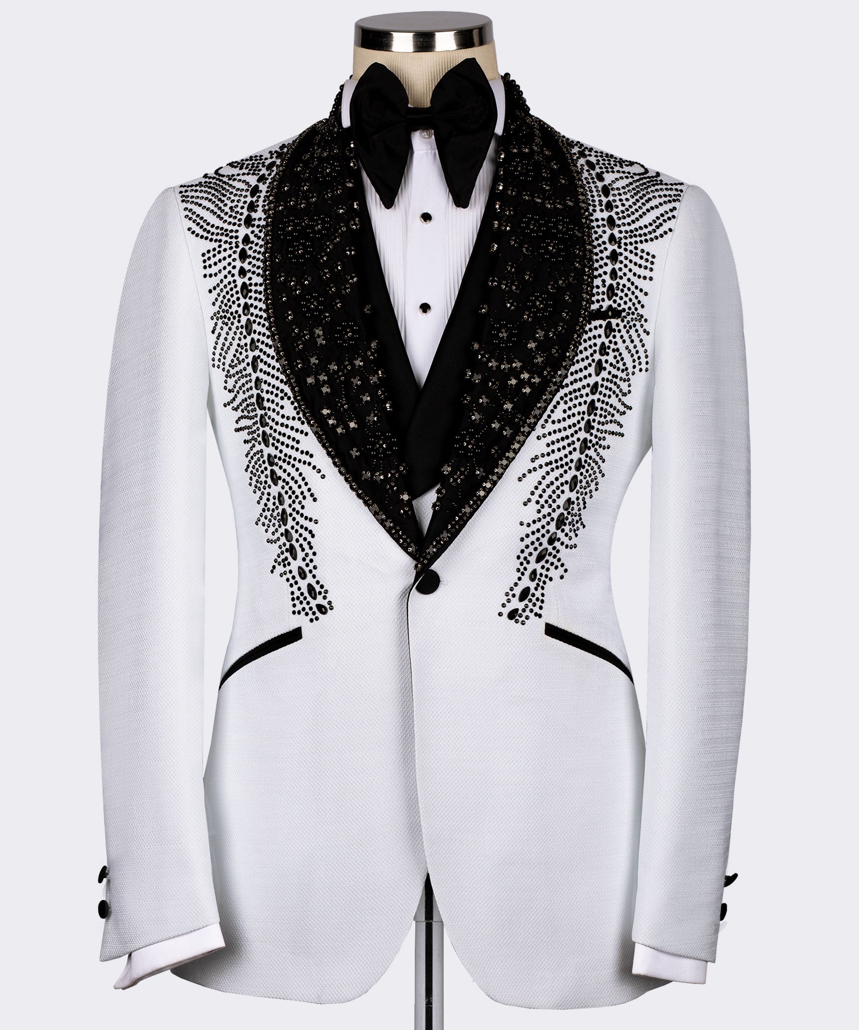 White tuxedo jacket with black stone-embroidered feather stencil lapels