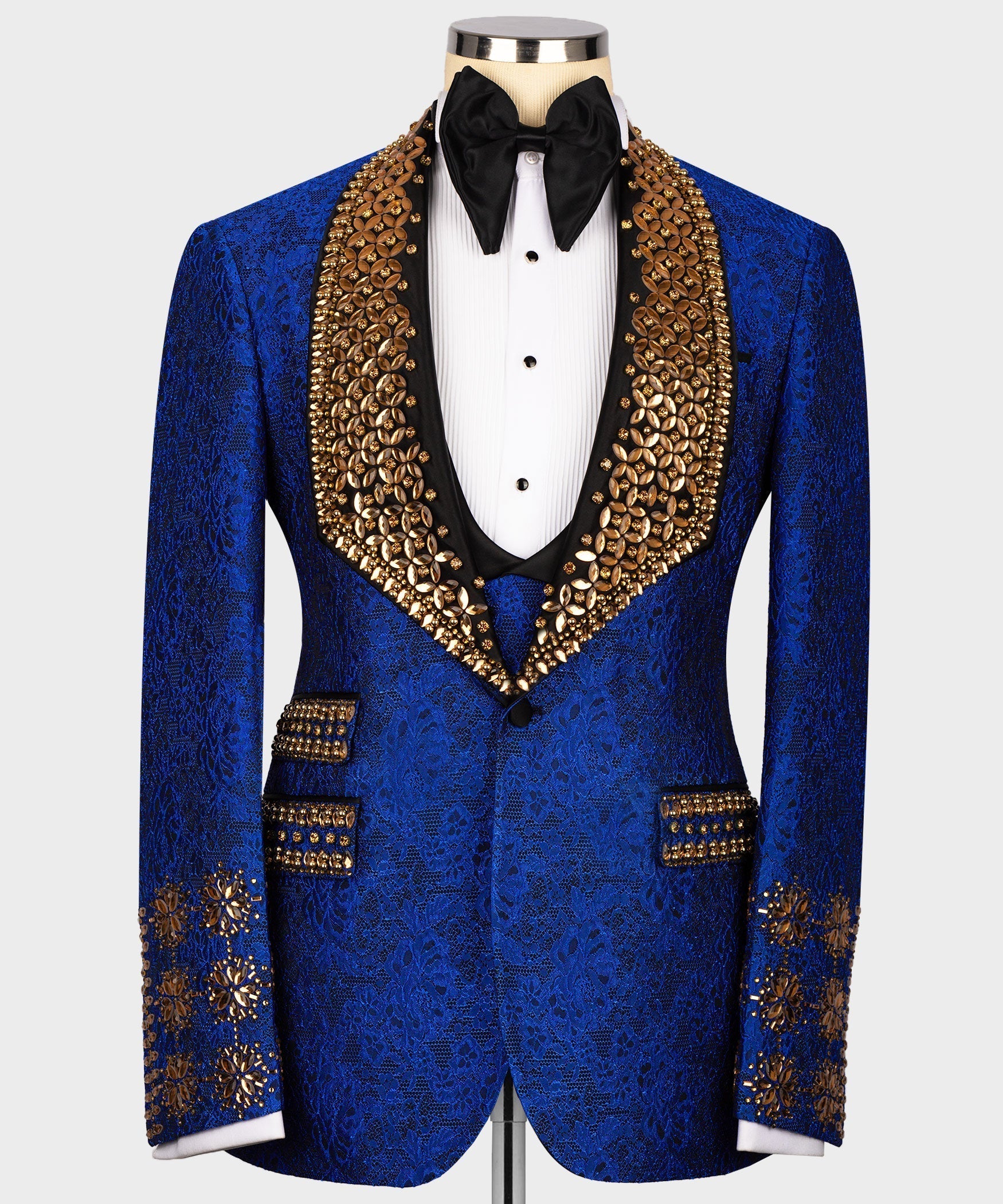 Blue silk tuxedo jacket, black lapels, gold gem trim, satin bow tie