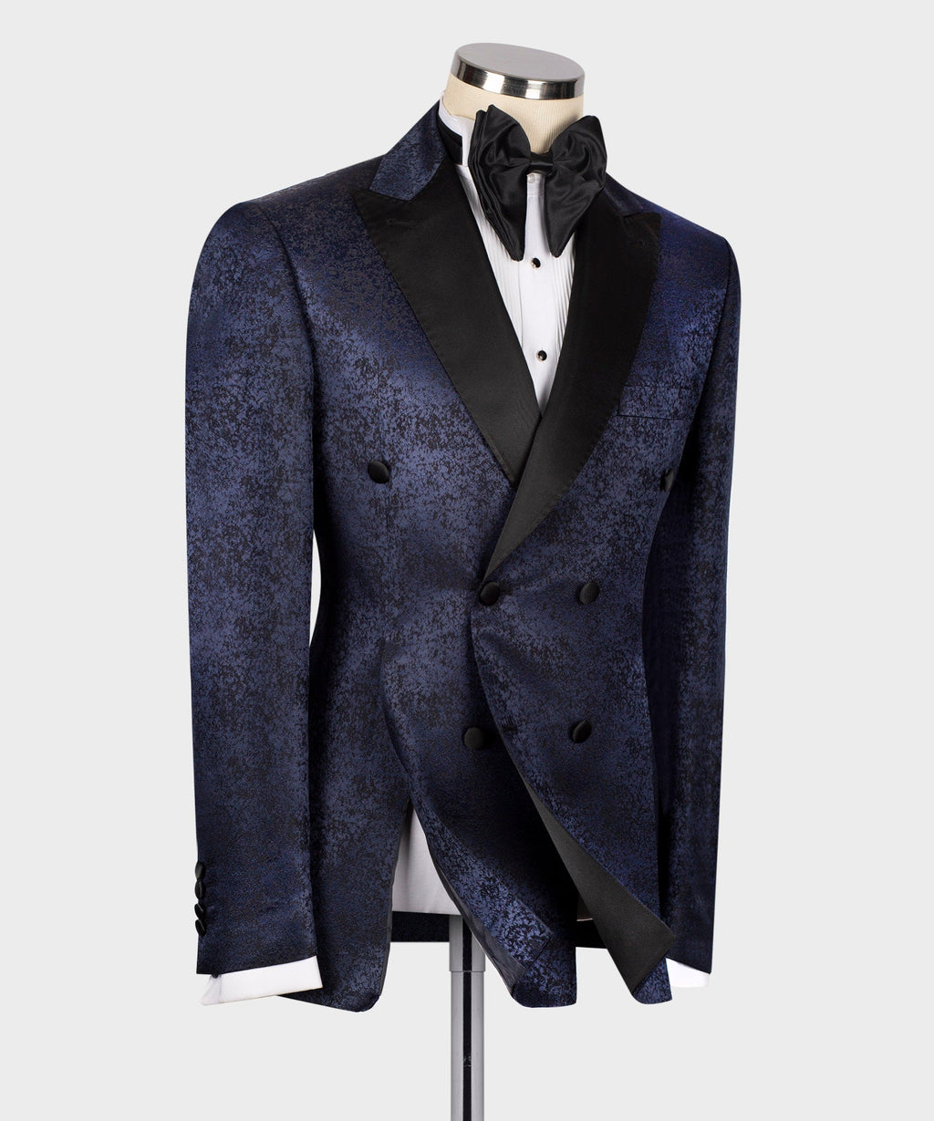 Navy patterned tuxedo jacket with satin lapels, black bow tie, four-button front