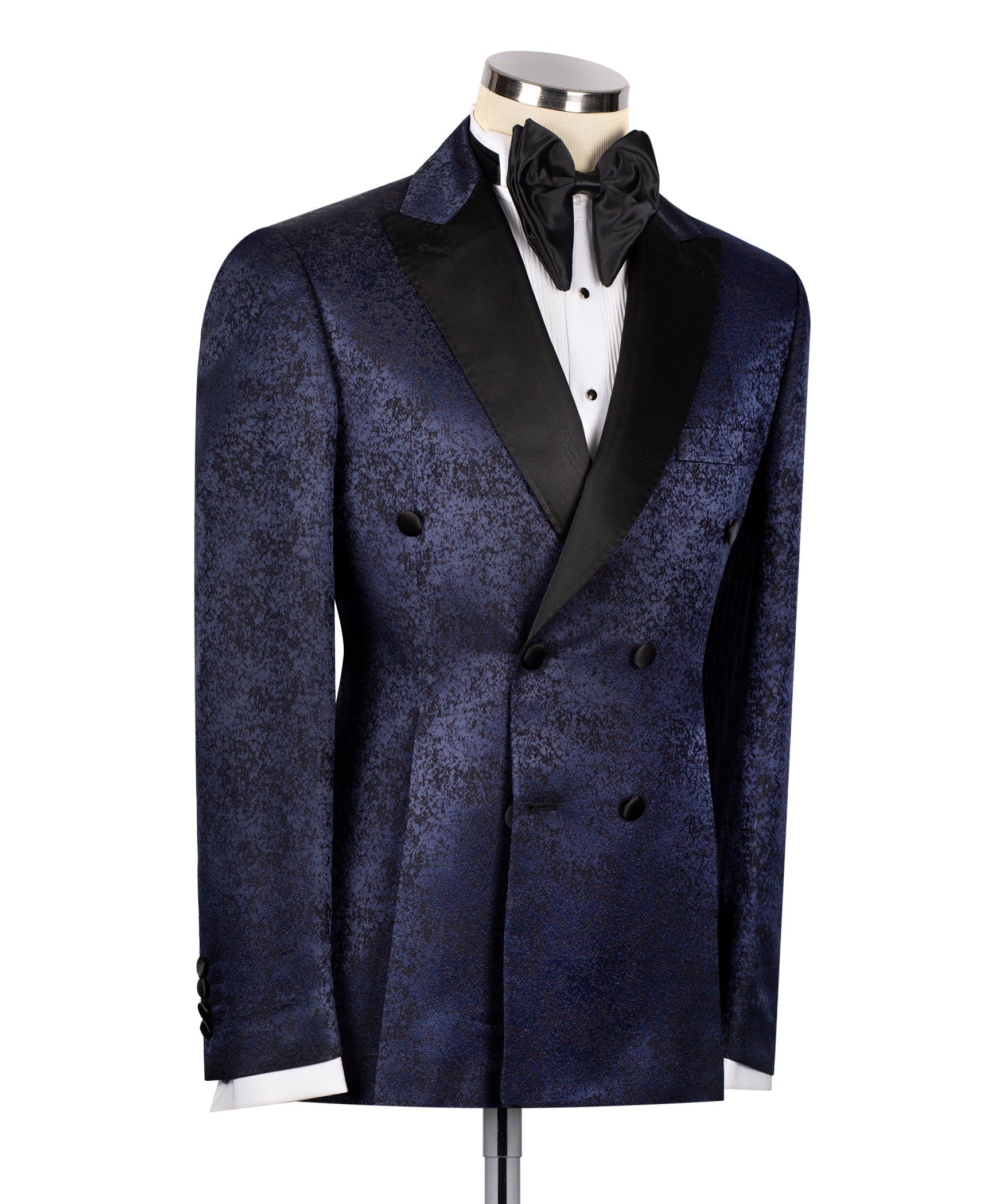 Navy patterned tuxedo blazer with black satin lapels and bow tie, front view