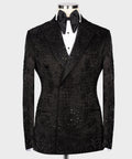 Black embroidered tuxedo jacket with satin bow tie and white shirt front