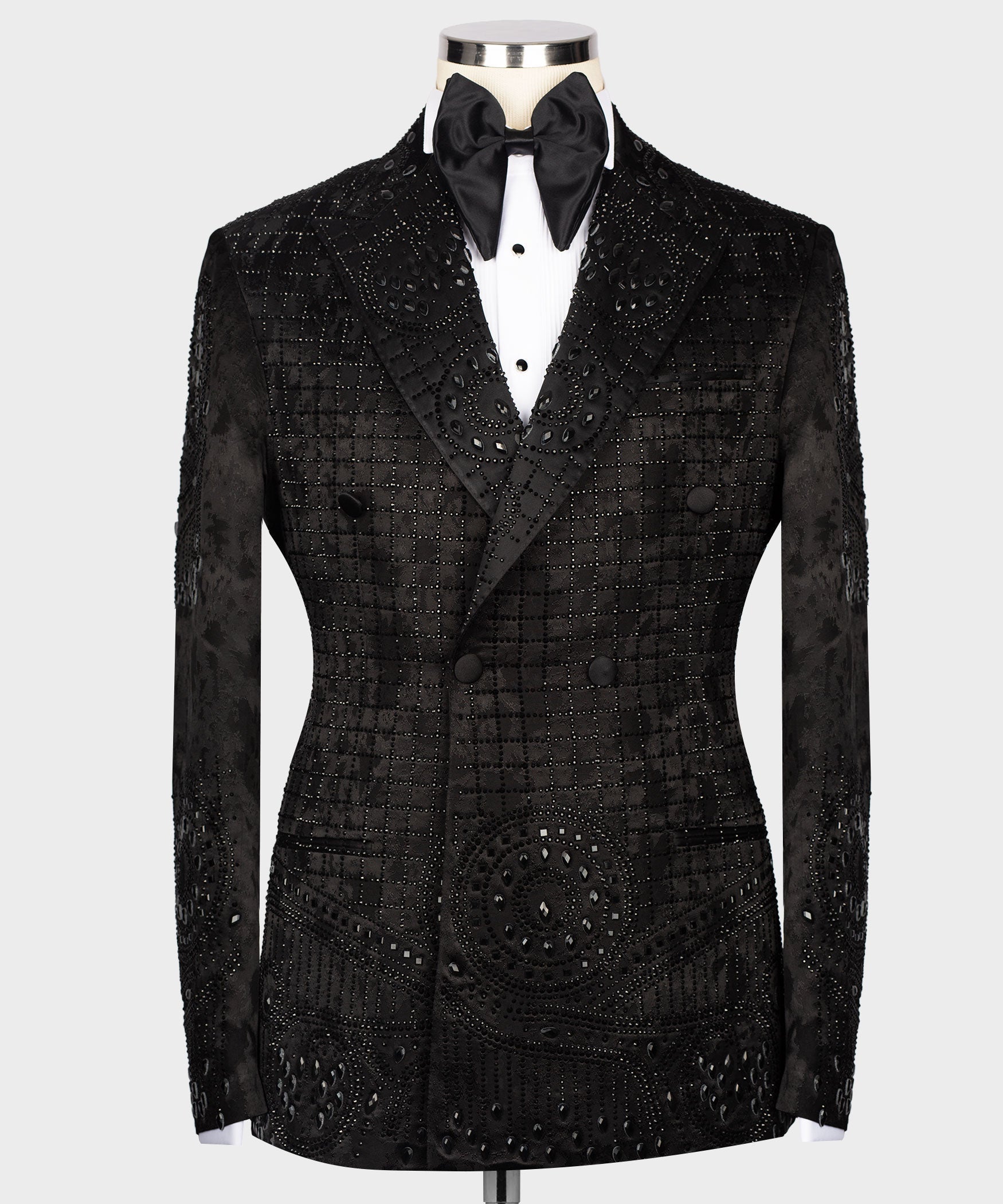Black embroidered tuxedo jacket with satin bow tie and white shirt front