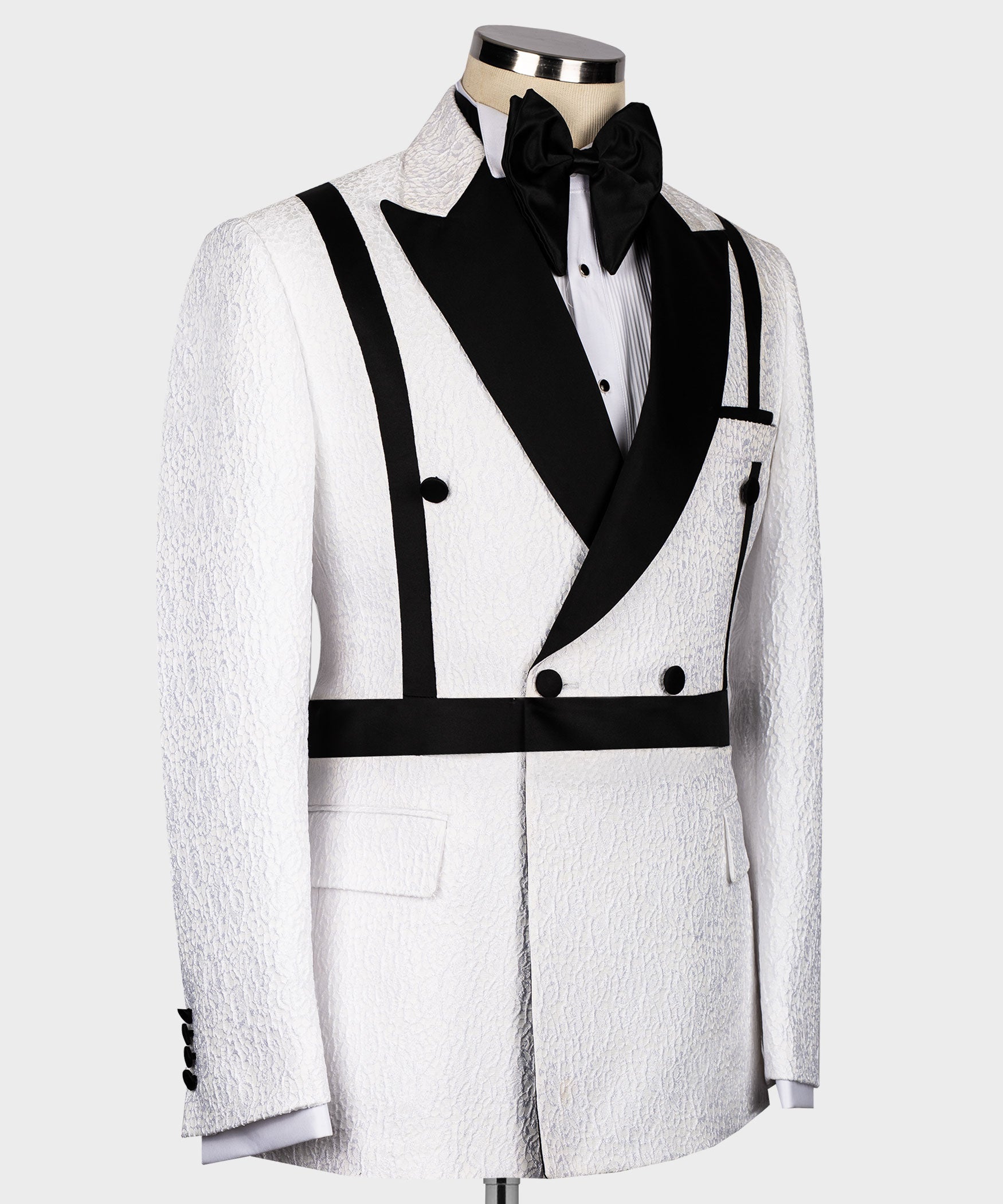 Double-breasted black-and-white tuxedo jacket with satin lapels, bow tie and waistcoat