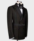Black double-breasted tuxedo jacket side view with self belt and textured fabric