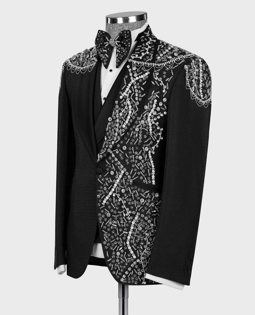 Black tuxedo jacket with jeweled embroidery on vest front and lapel