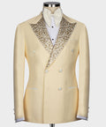 Light yellow tuxedo jacket with gold gemstone-embroidered satin lapels