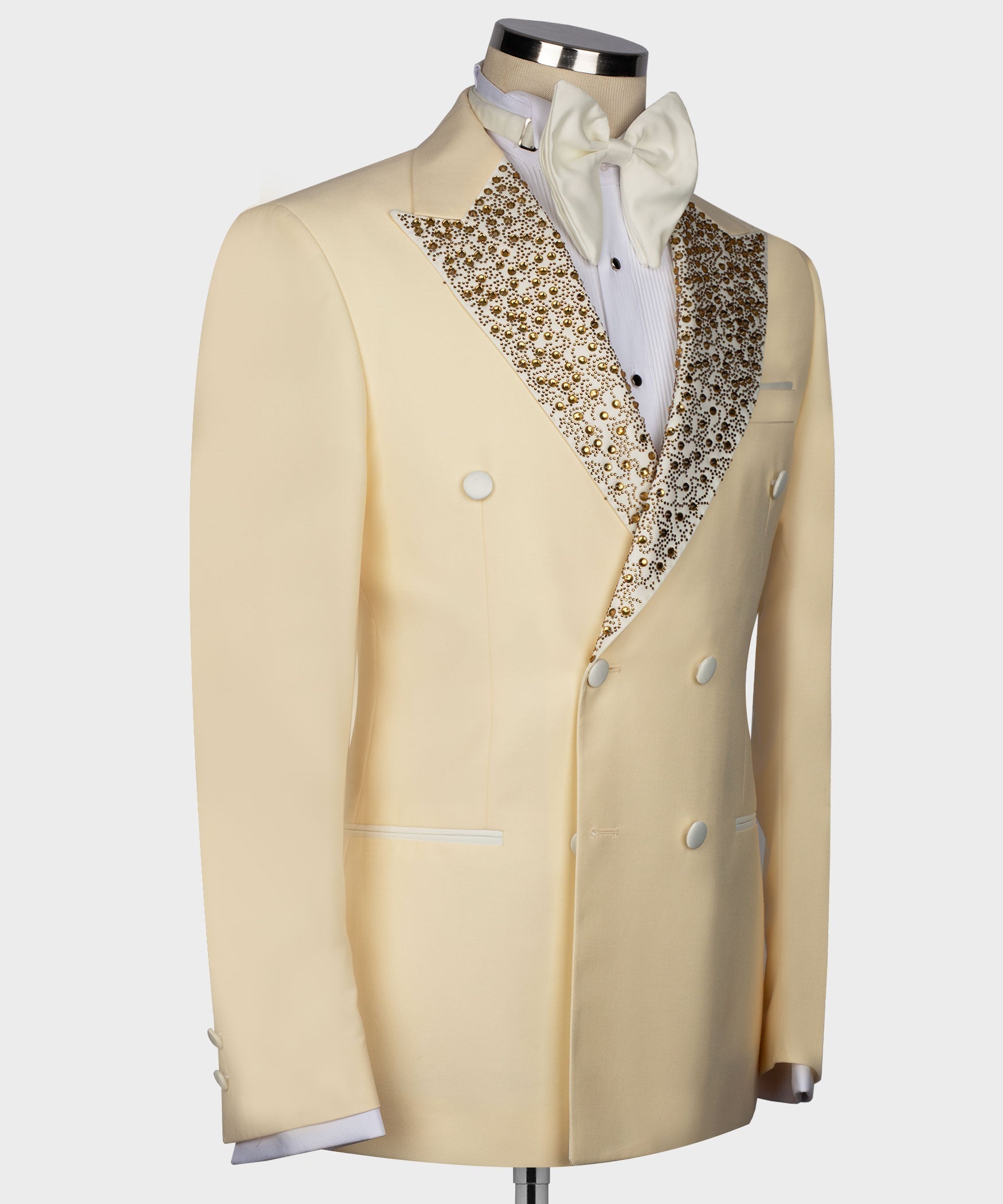Light yellow tuxedo jacket with gold embellished lapels and double-breasted button front
