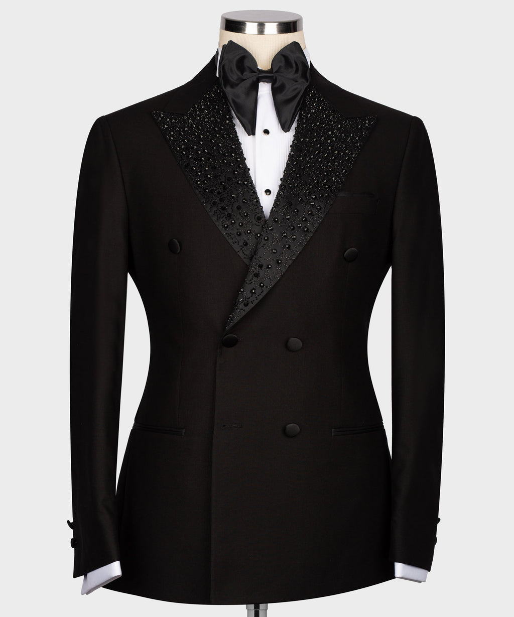 Black tuxedo jacket with gemstone-embroidered satin lapels and double-breasted buttons