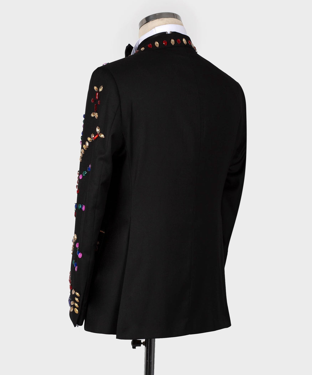 Black tuxedo jacket back view with crystal embellishment along the left shoulder