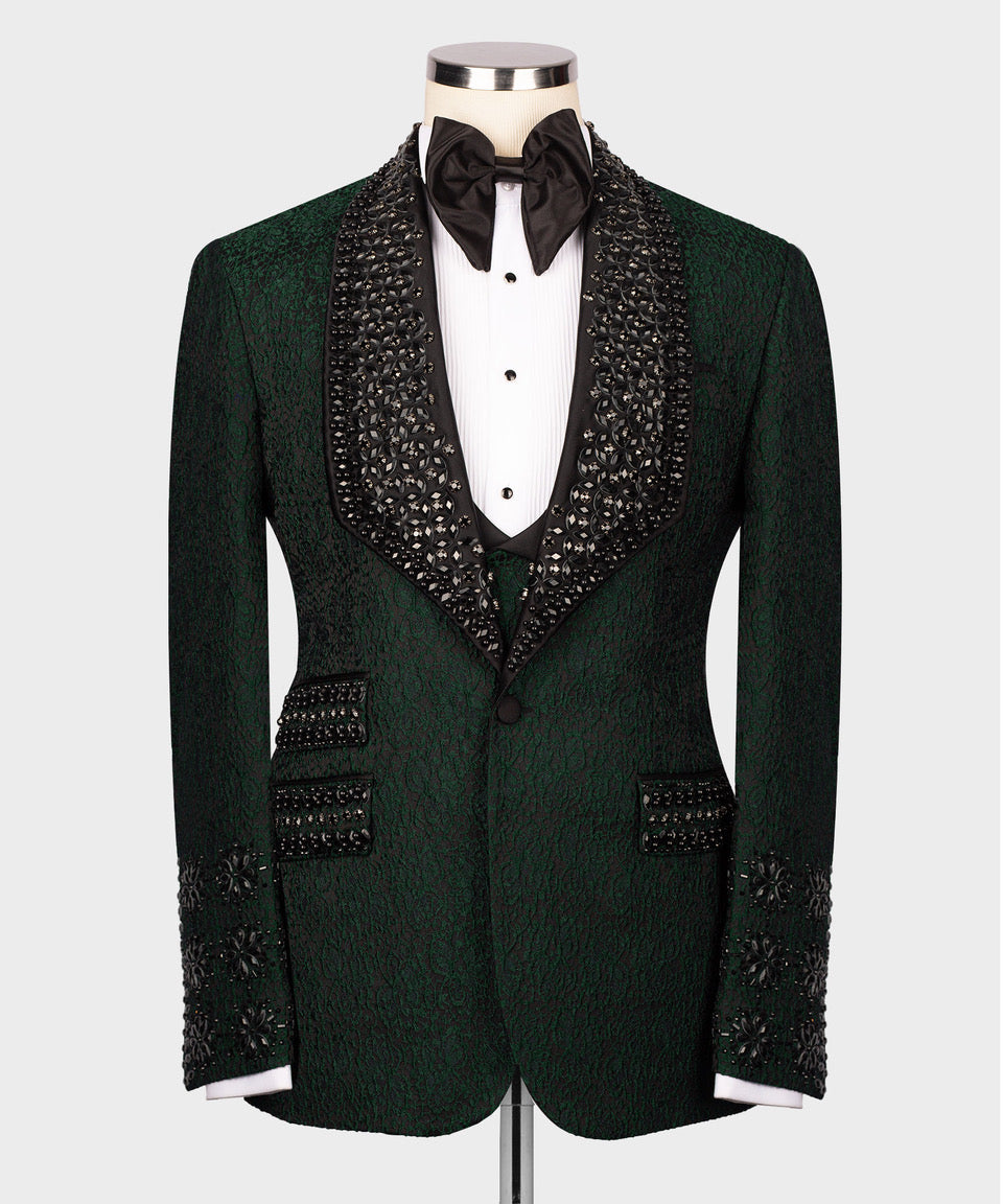 Dark green tuxedo jacket with black embellished lapels, white shirt, black bow tie