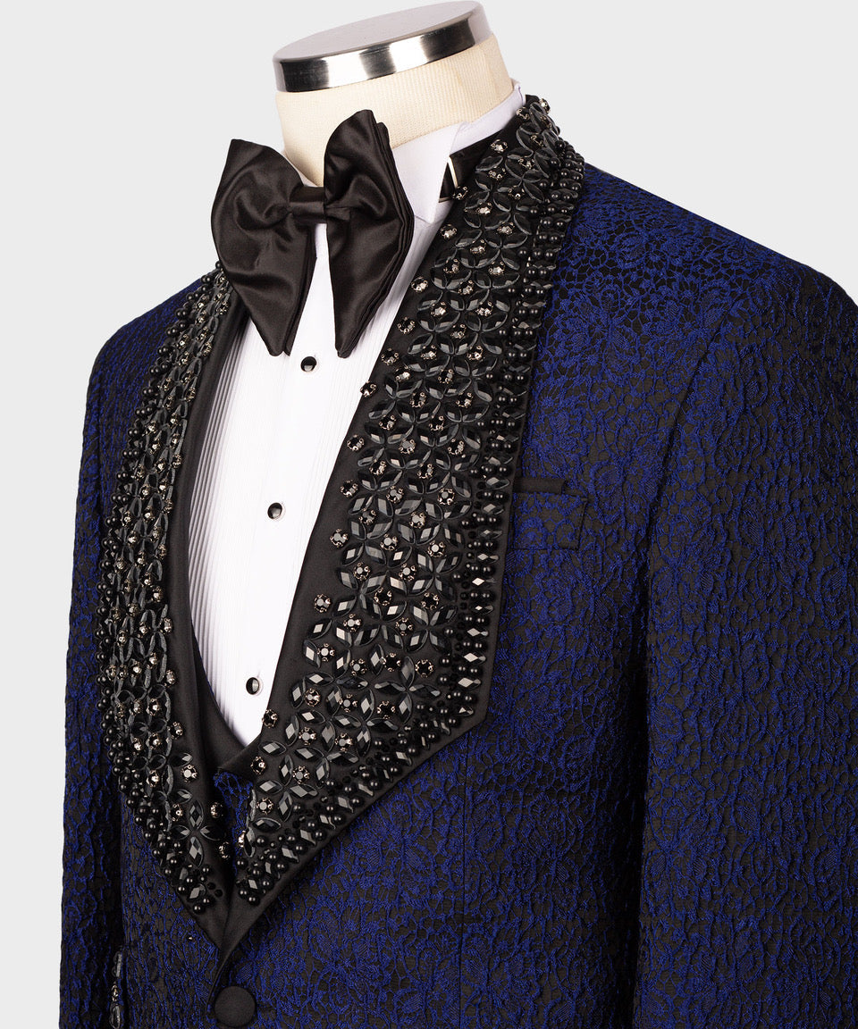 Jeweled black lapel detail with satin bow tie and white dress shirt front