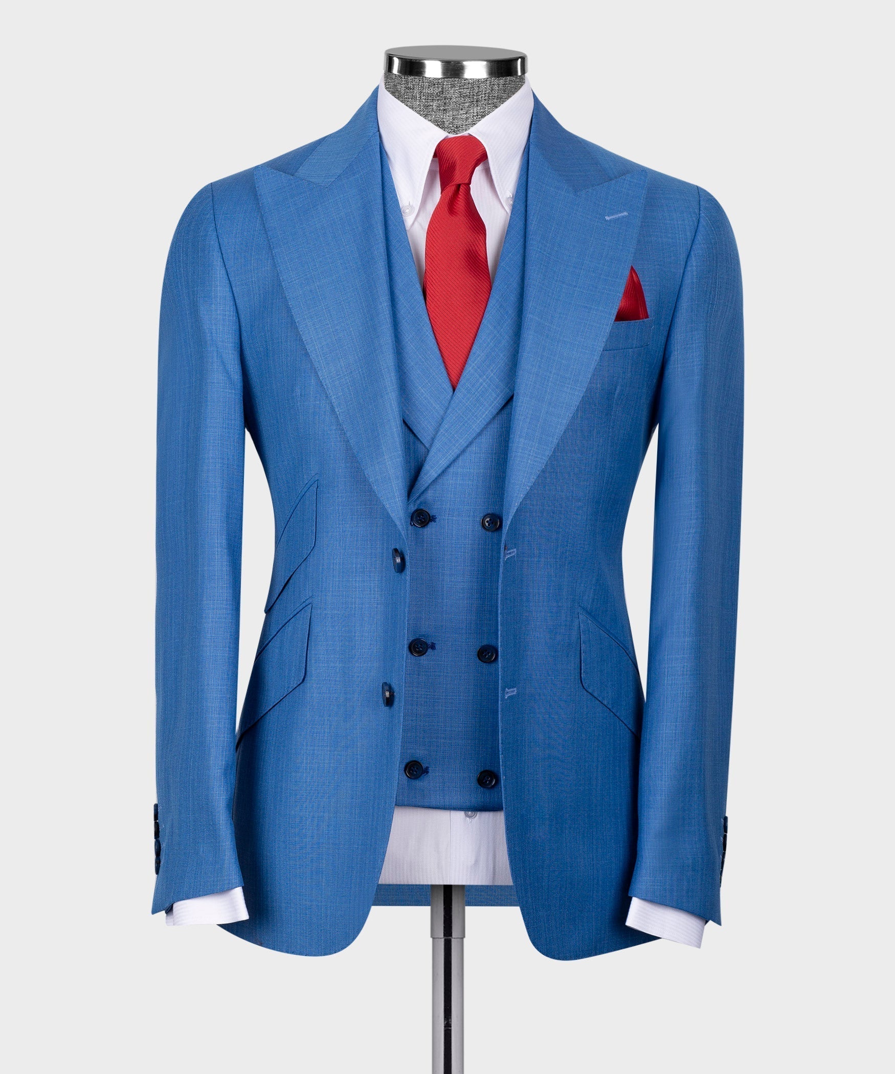 Blue 3-piece suit with vest, white shirt, red tie, and red pocket square
