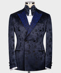 Navy formal tuxedo jacket with gemstone-embroidered blue lapels and satin bow tie