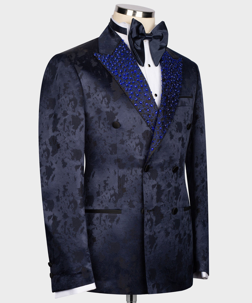 Blue-stone embroidered lapels on navy double-breasted tuxedo jacket, side view