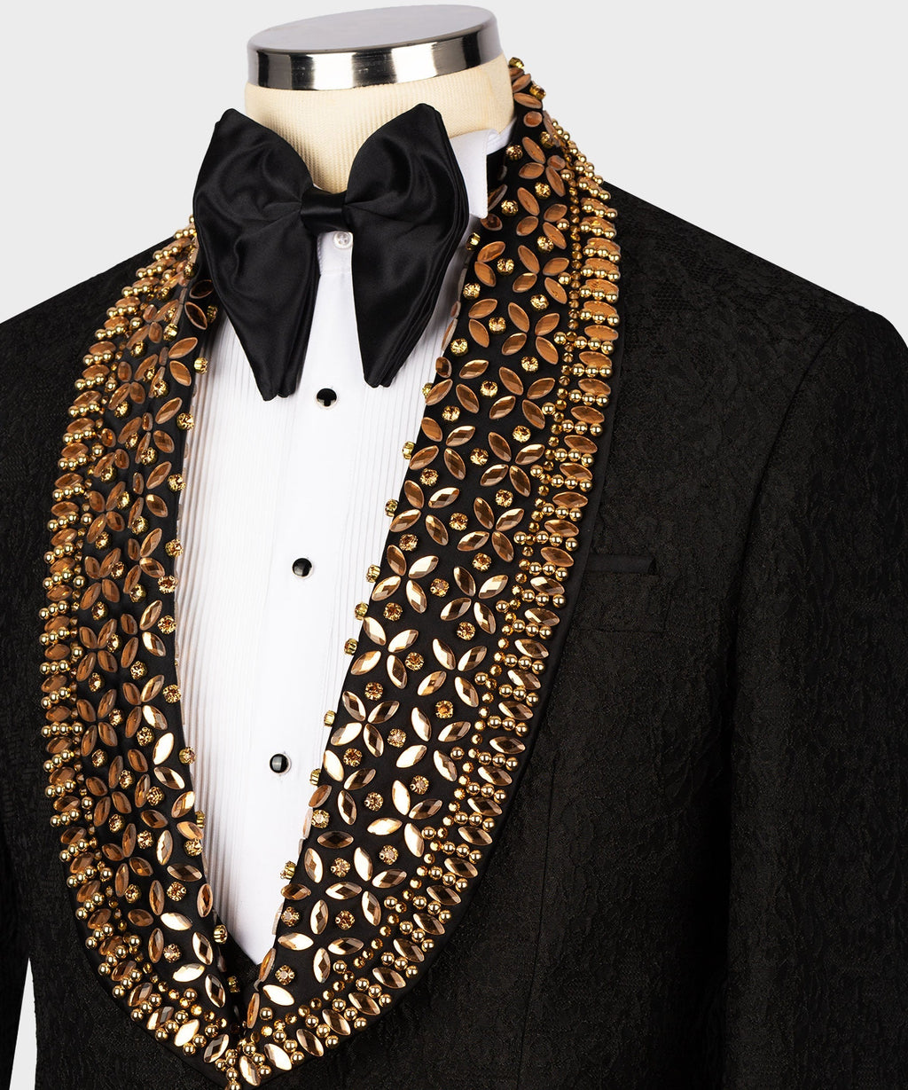 Black tuxedo with gold embellished shawl lapel and black satin bow tie