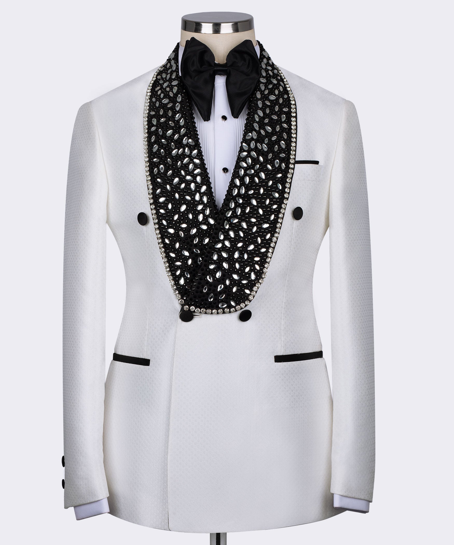 White tuxedo jacket front with black rhinestone-patterned lapel and black bow tie