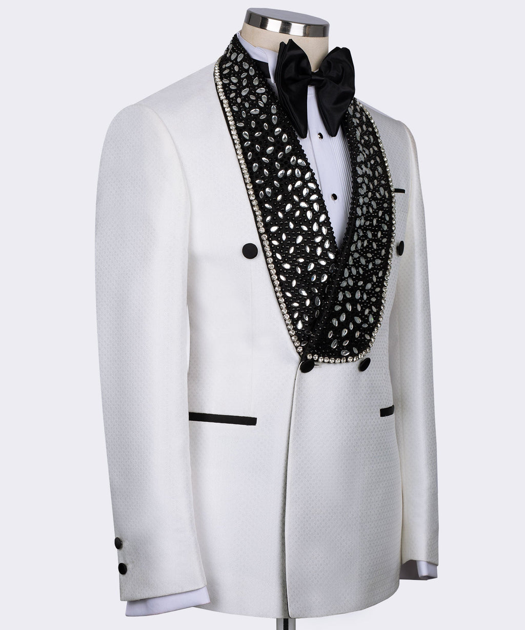 White tuxedo jacket side view with black gem-studded lapel and black bow tie