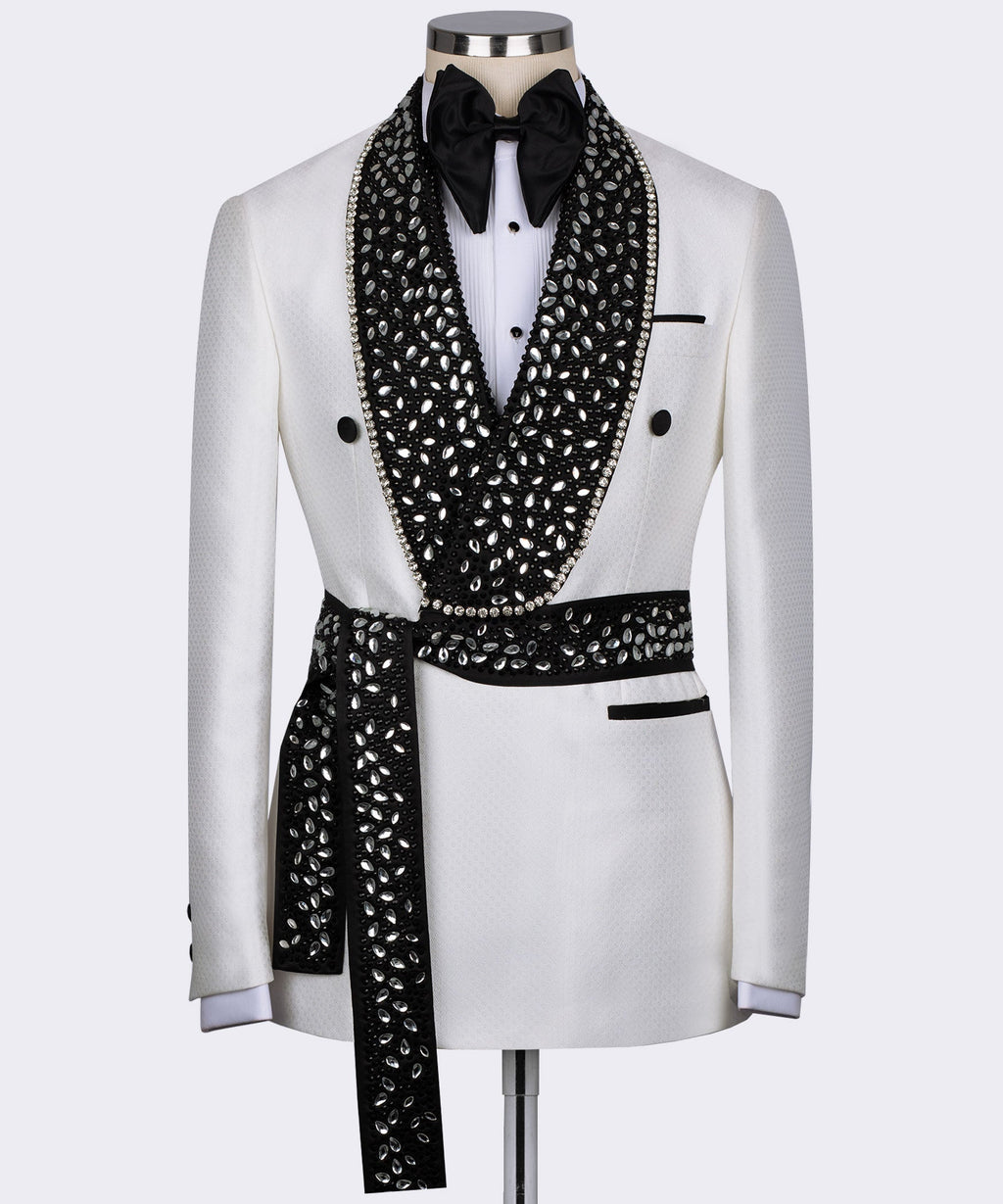 White tuxedo jacket with black jeweled lapels, bow tie, satin trim, and buttons