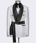 White tuxedo jacket with black jeweled lapels, bow tie, satin trim, and buttons